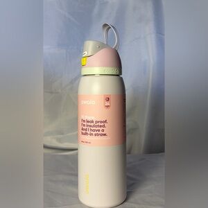 Owala insulated water bottle with a built-in straw. Candy Coated Owala 40 oz. 1